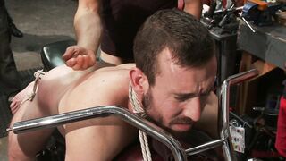 Muscled mechanic, bound, fucked from...